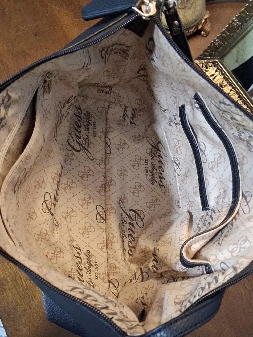 GUESS Black Pebbled Leather Messenger Bag with Gold Logo